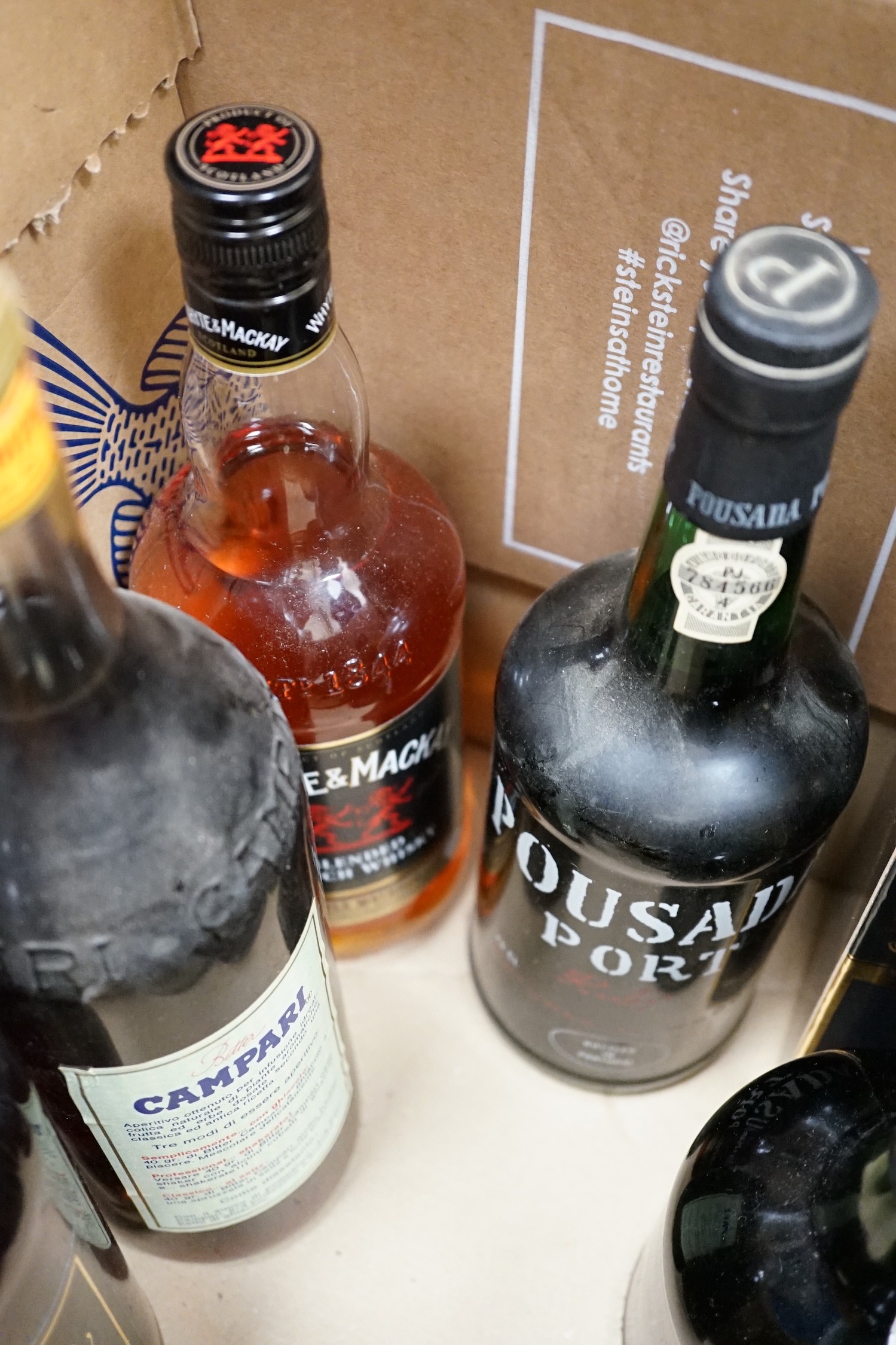 Nine bottles of selected spirits and port; to include Pousada Port, Whyte & Mackay scotch whisky, Courvoisier, Johnnie Walker Black Label scotch whisky and others (9)